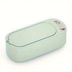 Portable eyeglass cleaner